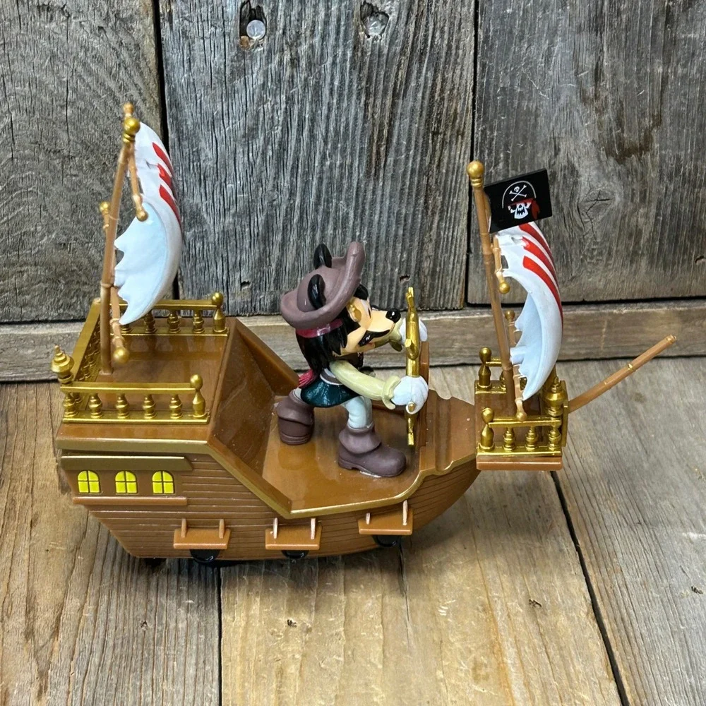 Disney Parks Pirates of the Caribbean Mickey Mouse Pirate Ship Toy Rolling Brown